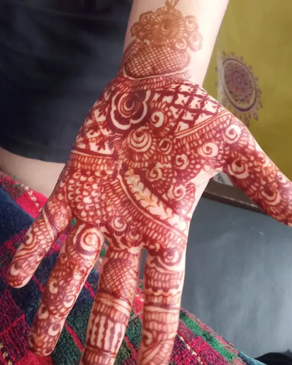 This is a great example of the initial stain color. This bright reddish-orange is the first stage of the color journey, which will darken significantly over the next day or two.