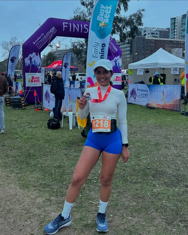 This is the feeling I train for. The moment you cross the finish line, medal in hand, knowing you did the work. My coaching is designed to get you here, whether it's your first 10k or a full marathon.