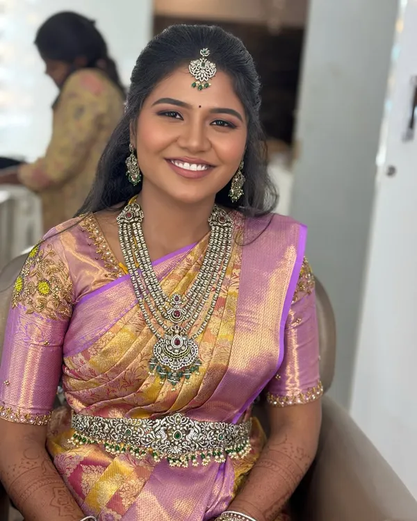 My beautiful bride Gopika looking radiant for her reception in Karur. We chose a subtle yet glowing makeup look to complement her lavender silk saree and stunning diamond jewellery.