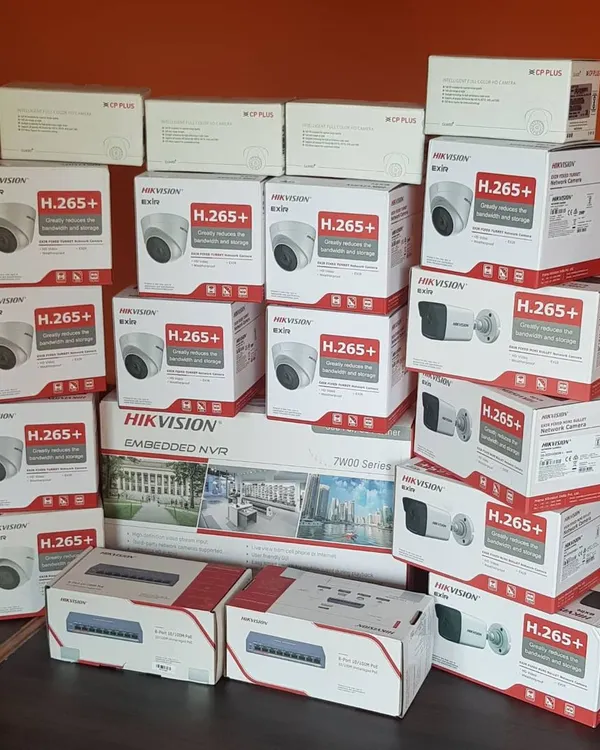 A complete kit ready for a large IP camera installation. This includes multiple Hikvision turret and bullet cameras, an embedded NVR, and PoE network switches.