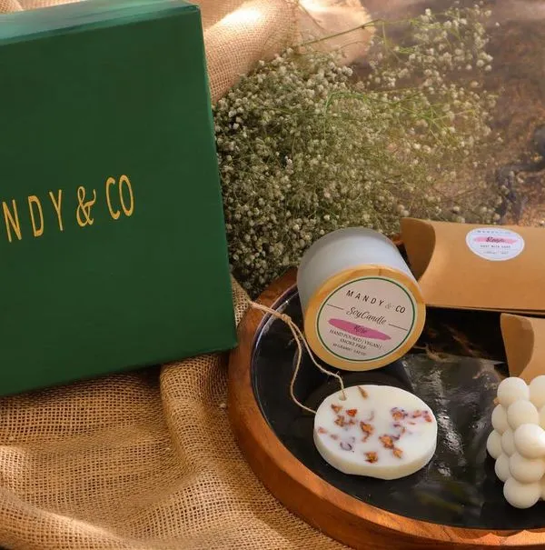 My "Radiant Diwali Treasures Gift Box," a luxurious collection to celebrate the festival of lights. It includes two artisanal soaps, a soy bubble candle, a scented soy candle, and a wax tablet.