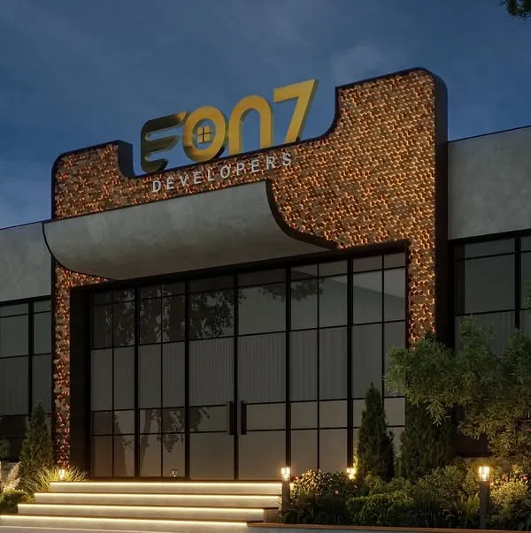This commercial facade for EON7 Developers in Gurugram was designed to be a modern architectural statement, balancing bold form with elegant details. We used a textured, warm central surface that glows under strategic night lighting to create drama and grandeur, while expansive glass panels introduce a feeling of transparency and openness.