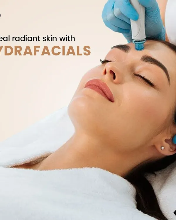 A client receiving a HydraFacial, a treatment designed to reveal radiant skin. The procedure is comfortable and focuses on deep cleansing and hydration, making it suitable for nearly all skin types.