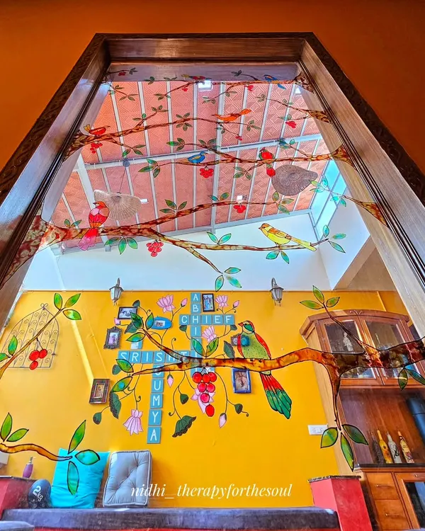 This custom glass painting was designed for a penthouse terrace window, bringing a flock of tropical birds indoors. It shows how art can be integrated directly into your home's architecture, creating a unique, light-filled feature.