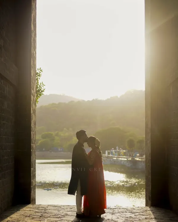 A quiet moment as the sun sets, framing a promise of forever. I look for these timeless silhouettes where love speaks louder than words, creating a piece of art from your story.