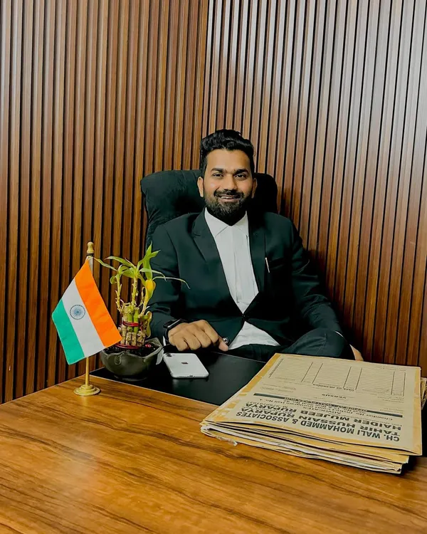 Seated in my chamber, ready to begin the day's work. A well-prepared case is the foundation of a successful legal outcome, and that preparation starts right here.