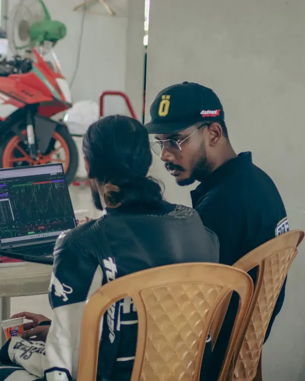 An instructor from our data partner, DDRS, reviewing telemetry with a rider. This one-on-one analysis is where real breakthroughs happen.