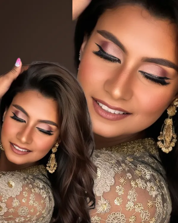 This is my signature bronze glam. I focus on creating a warm, sun-kissed glow with shimmering eyeshadows and a dewy skin finish that makes you look radiant.