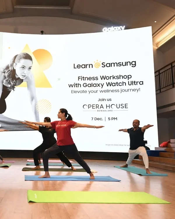 We guide employees through foundational asanas like Virabhadrasana II (Warrior II pose) during a corporate wellness workshop. This session, held in partnership with Samsung at the Opera House in Bengaluru, was designed to improve focus and reduce workplace stress through accessible yoga practices.