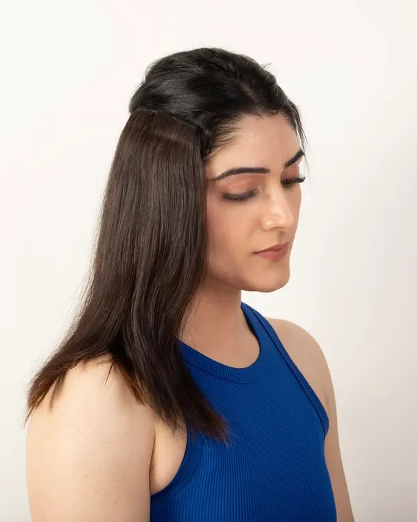 A model demonstrating the natural blend of a hair topper. This before-and-after style shot is crucial for showing product effectiveness.