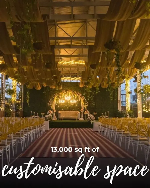 Welcome to your dream wedding setting. This is our Sky Terrace, a 13,000 sq ft customizable space ready to be transformed for your grand celebration, complete with elegant drapery, sparkling chandeliers, and seating for up to 600 guests.