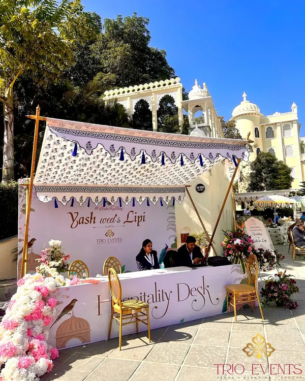 A beautifully designed hospitality desk to welcome guests. The first impression matters, and I ensure every detail, from the signage to the floral decor, reflects the elegance of the event.