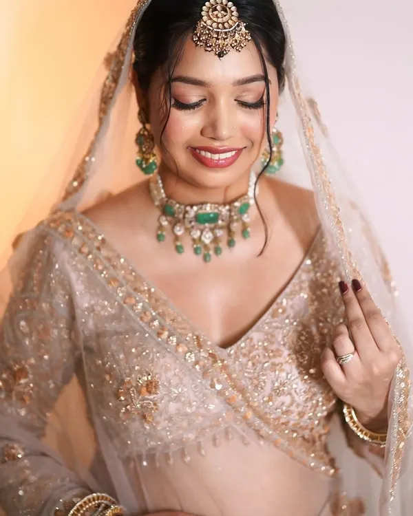 This is the essence of my work. A bridal look that is all about enhancing your natural beauty, giving you that lit from within glow. Notice the soft, skin like base and the gentle shimmer on the eyes that makes them sparkle with happiness.