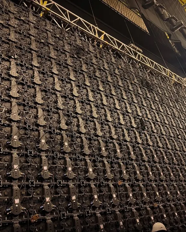 The intricate backend of a massive LED screen being assembled by our technical team. This is the detailed work that powers the stunning visuals at our events.