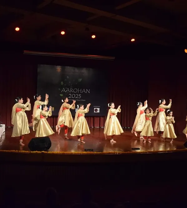A grand Kathak performance by our students at Aarohan 2025. Performing on a professional stage with live musicians is an invaluable experience we provide.