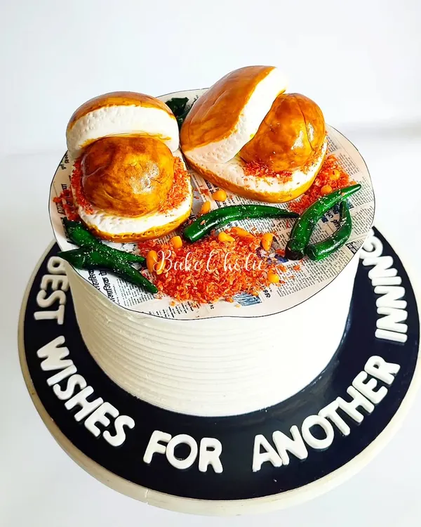 Vada Pav, anyone? This is the only non-spicy Vada Pav you'll find in town! A super fun, hyper-realistic cake for a true Mumbai street food lover.