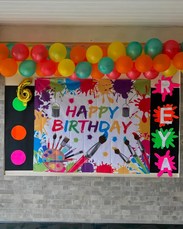 Welcome to Reya's arty 6th birthday party! I set up colorful, personalized banners and decor to make the birthday child feel celebrated from the moment they walk in.