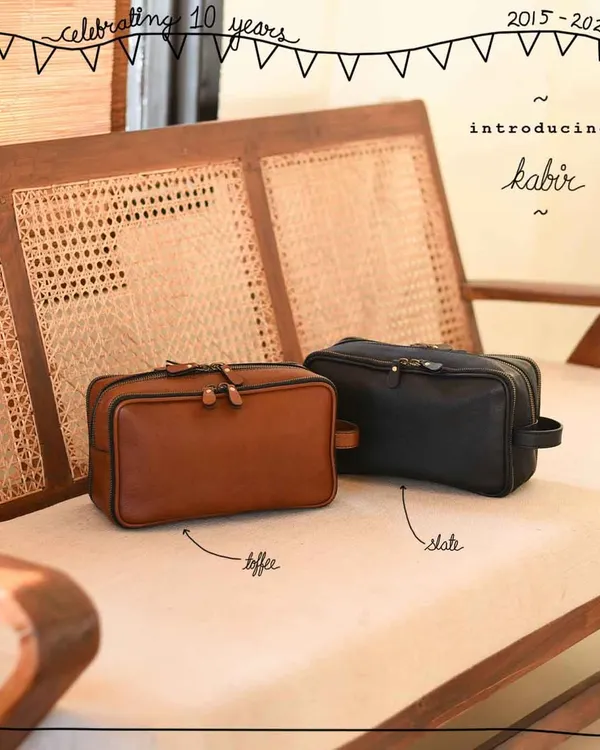 Introducing the Kabir, our versatile and spacious wash kit, shown here in classic Toffee tan and Slate black. With three main compartments and a soft body, it's the perfect travel organizer for him or her.