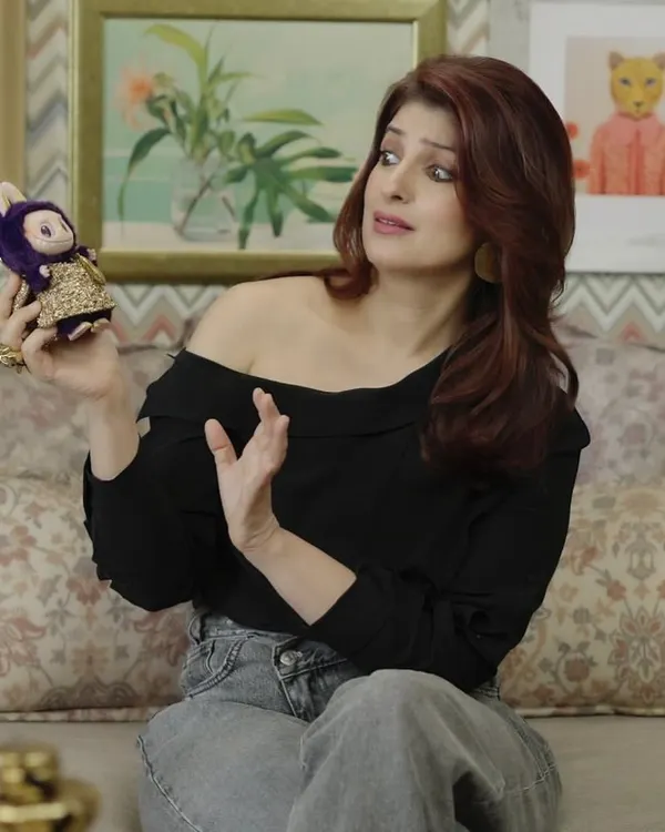 The celebrated author and designer Twinkle Khanna lights up the frame in a setting layered with our elegant wallcoverings. The space reflects a refined taste with a dash of playful charm, a testament to our collaborative process.