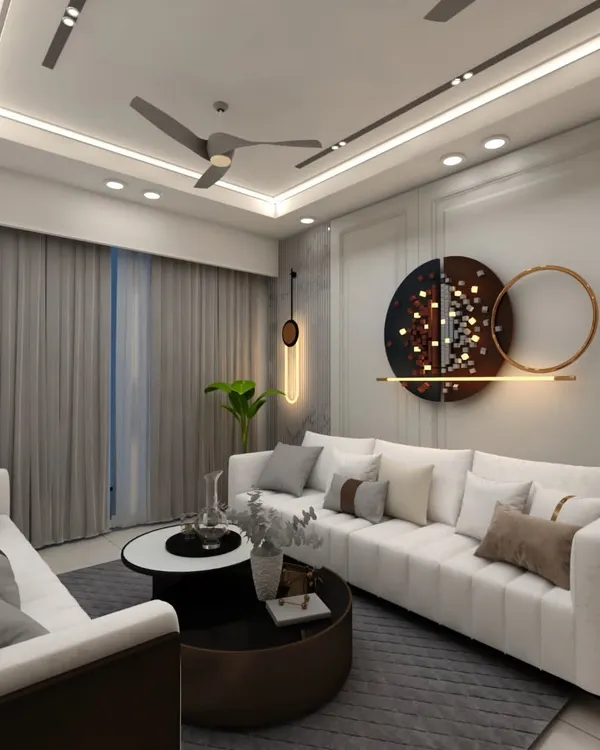 This living room is designed around a neutral color palette to create a calm and inviting atmosphere. The custom wall art and layered lighting add a touch of personality and warmth to this modern space.