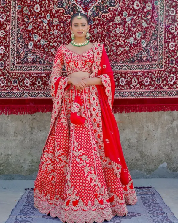 This is it. The classic red bridal lehenga that lives in every bride's dreams. I designed this piece with intricate gold embroidery and traditional motifs to make you feel like absolute royalty on your wedding day.