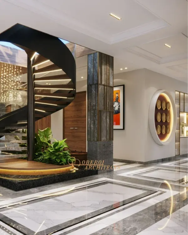 This central atrium makes a powerful first impression with its sculptural spiral staircase and integrated planter, turning a functional element into a work of art.