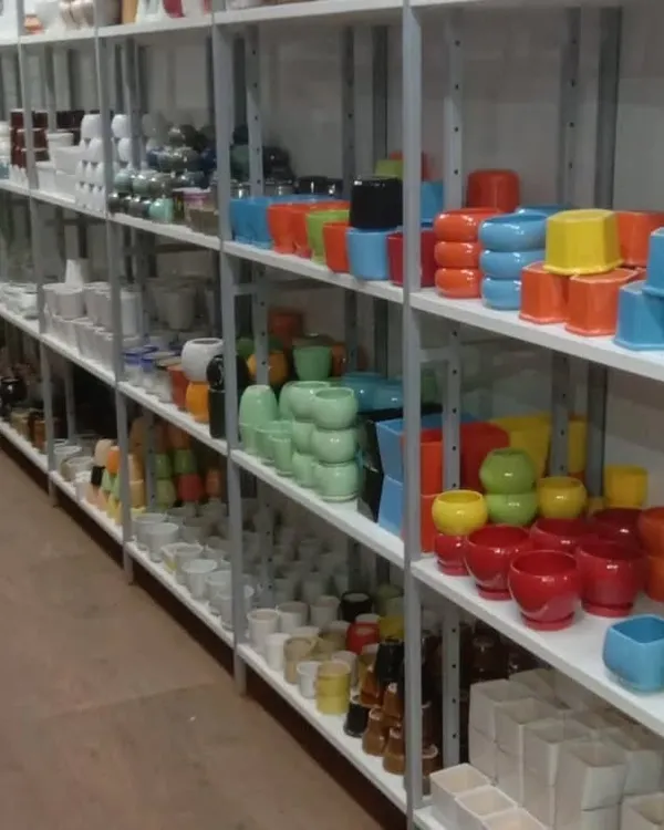 A view of our extensive collection of ceramic planters, available in a rainbow of colors and a variety of shapes and sizes to match any plant and decor.