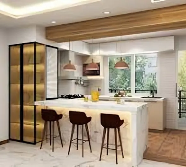 This bright and airy open-concept kitchen features a large marble-topped island with seating, perfect for casual dining. The design includes a full-height glass-fronted pantry and connects effortlessly to the rest of the living space.