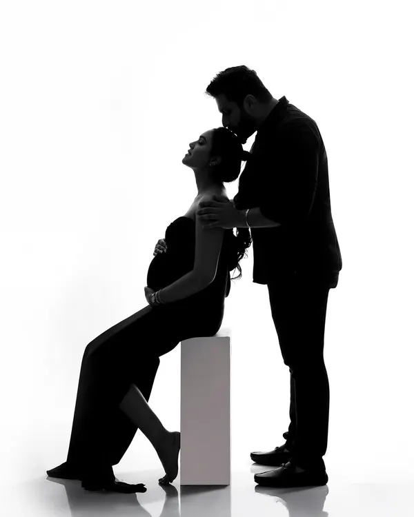 A powerful silhouette of a couple, showcasing the shape of their new beginning. This artistic style creates a timeless and emotional portrait.