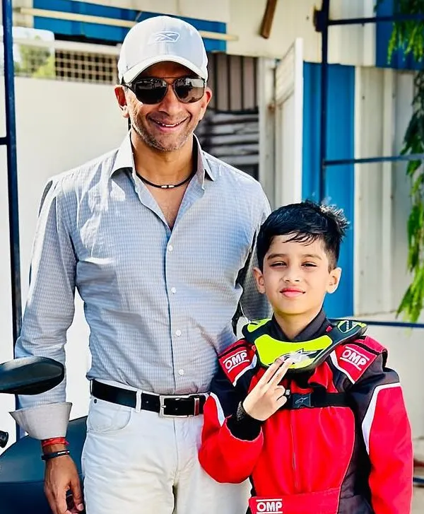 A star in the making. Our young driver gets a photo with Indian racing legend Narain Karthikeyan, a moment of inspiration for any aspiring champion.